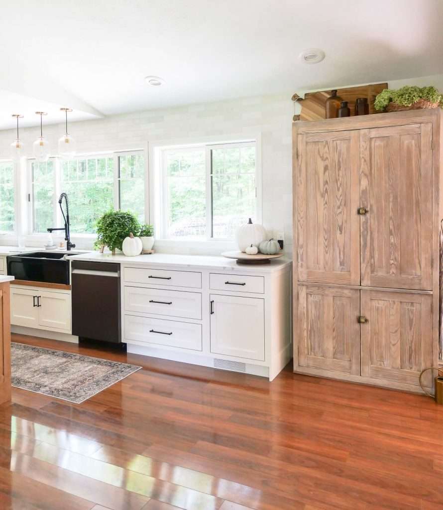 Cabinet looking into kitchen.