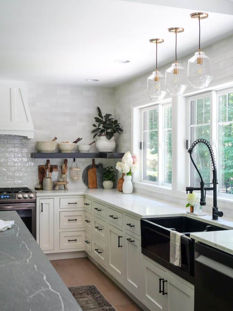 Kitchen with a black sink.