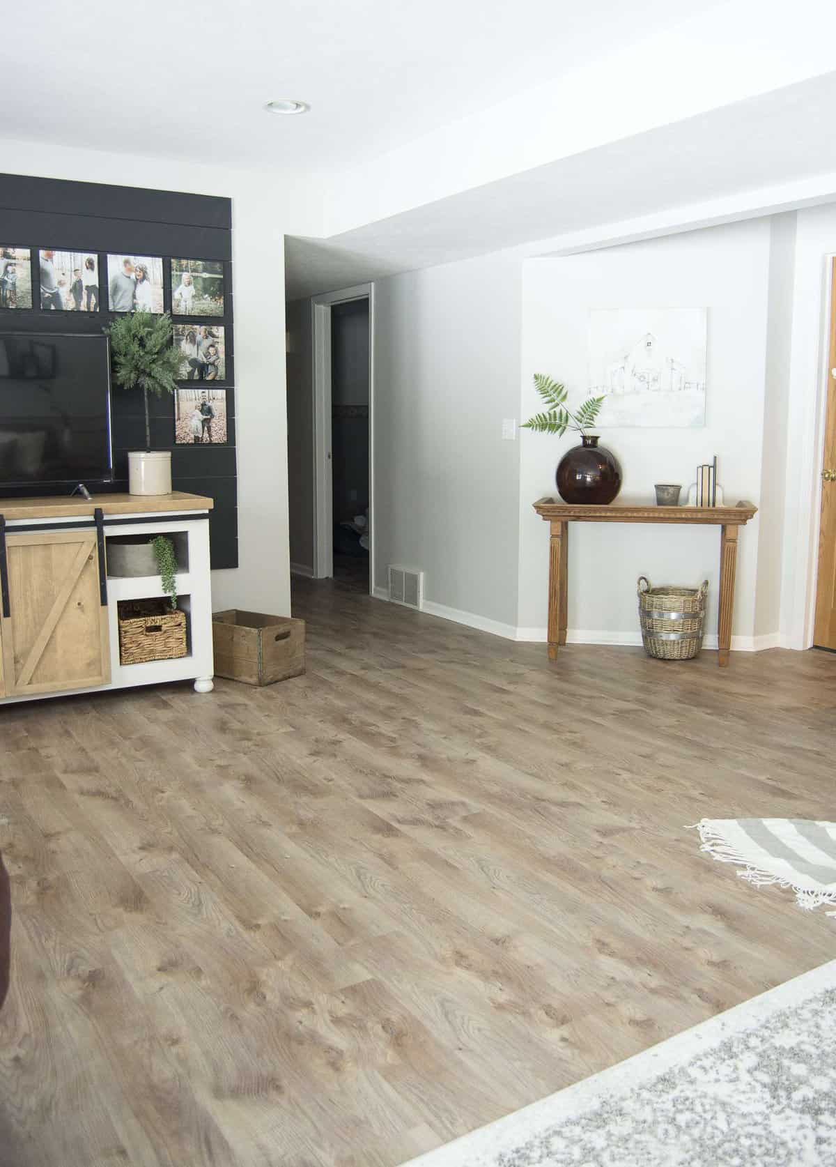 Looking for beautiful basement flooring that will stand up to water, pets and kids? Here is a modern farmhouse basement makeover with flooring made to last. #modernfarmhouse #basementflooring #basementremodel #fromhousetohaven