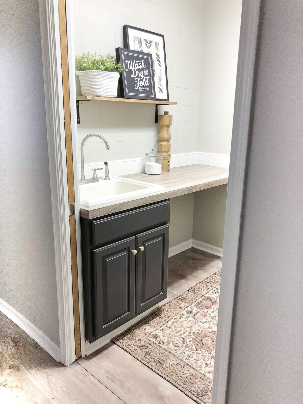 Looking for beautiful basement flooring that will stand up to water, pets and kids? Here is a modern farmhouse basement makeover with flooring made to last. #modernfarmhouse #basementflooring #basementremodel #fromhousetohaven