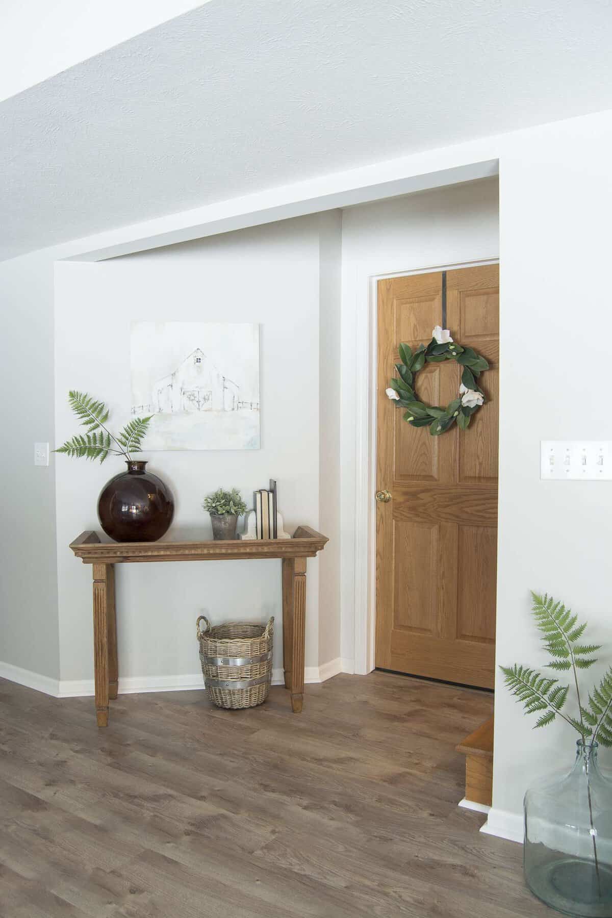 Looking for beautiful basement flooring that will stand up to water, pets and kids? Here is a modern farmhouse basement makeover with flooring made to last. #modernfarmhouse #basementflooring #basementremodel #fromhousetohaven