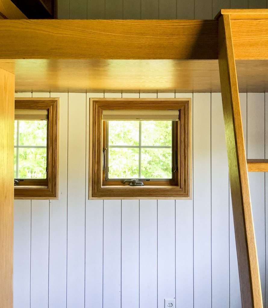 Window trim on a shiplap wall.