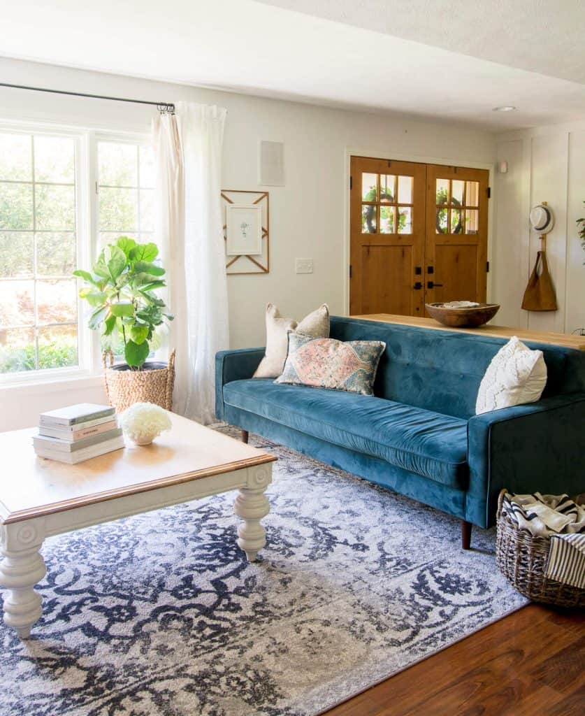 Living room with wood doors.