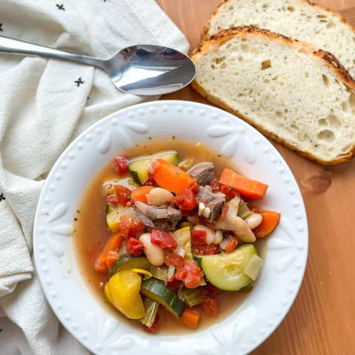 Venison vegetable soup with bread.