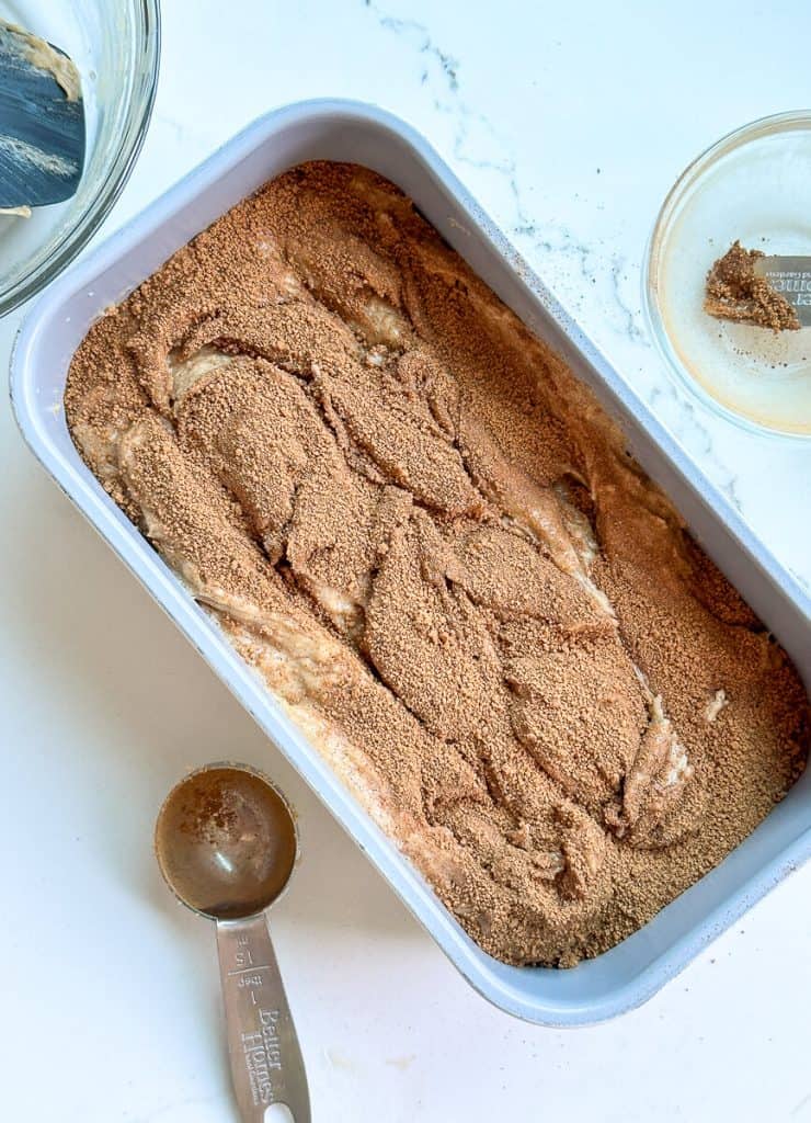 Mixed batter in a loaf pan.