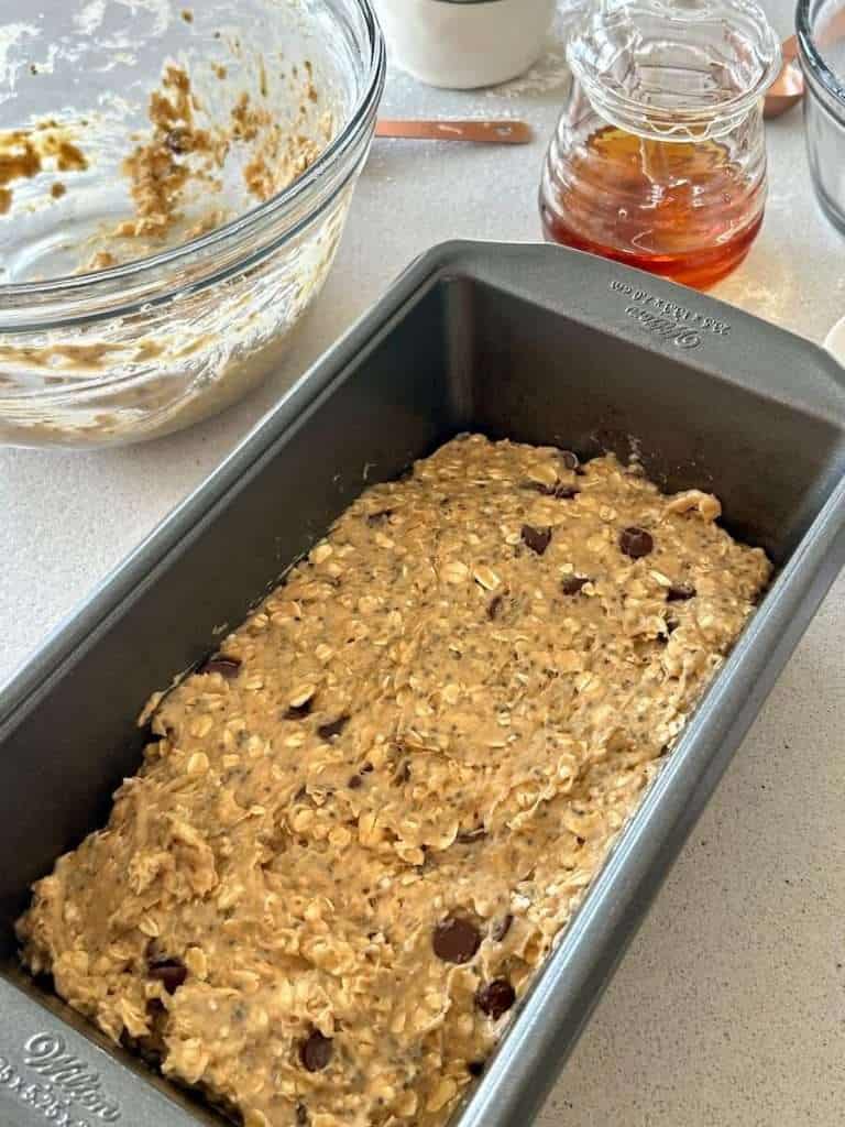 Loaf pan of banana bar batter