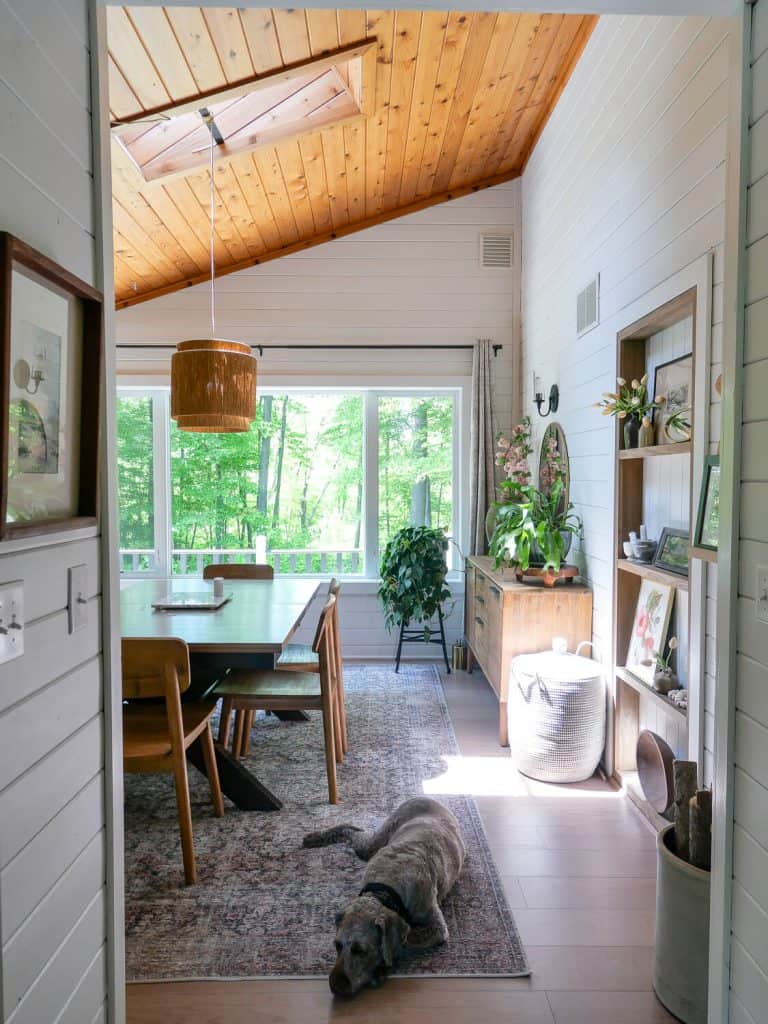 Dining room with cedar ceiling decorated for spring.