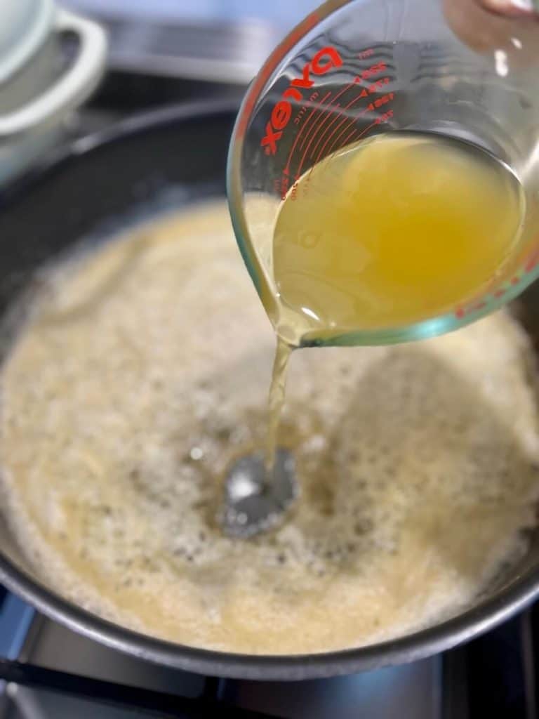 Chicken stock with butter.