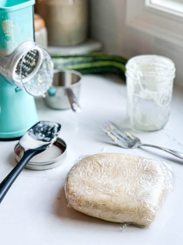 Wrapped dough in plastic wrap.