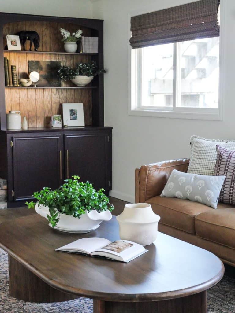 Bamboo shades in a cozy basement.