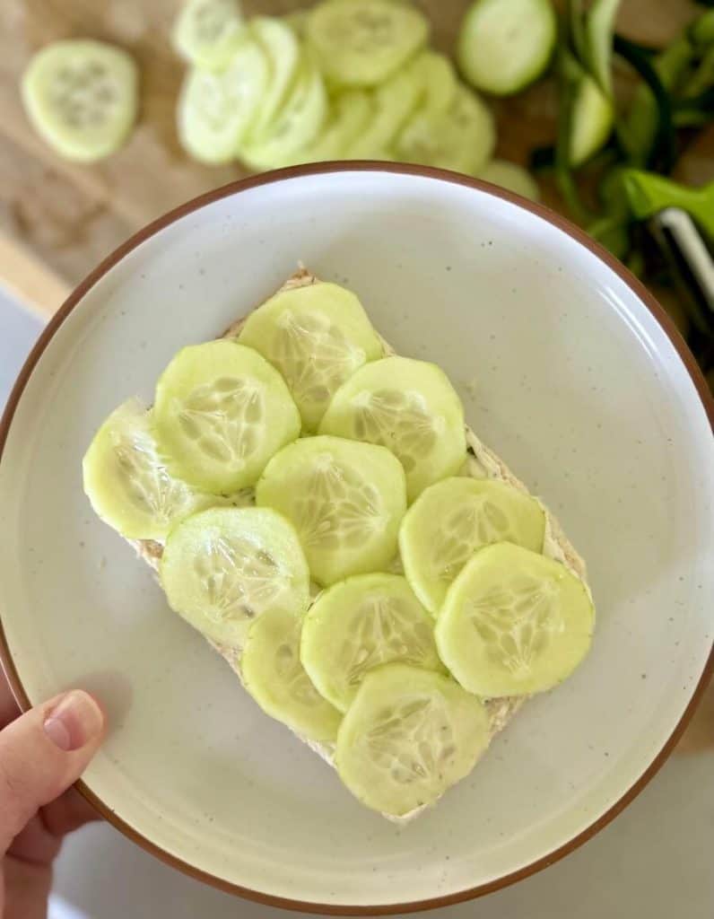 Layer of cucumber on bread.