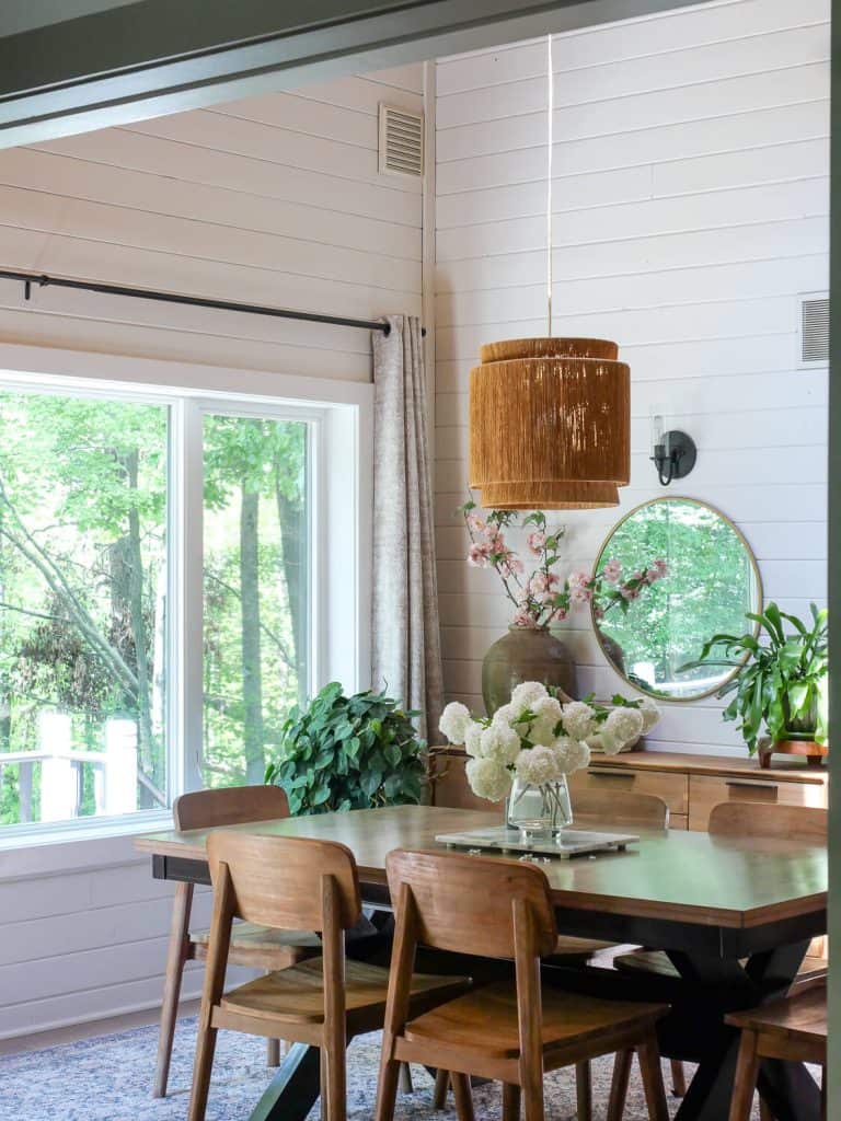 Dining room table with flowers.