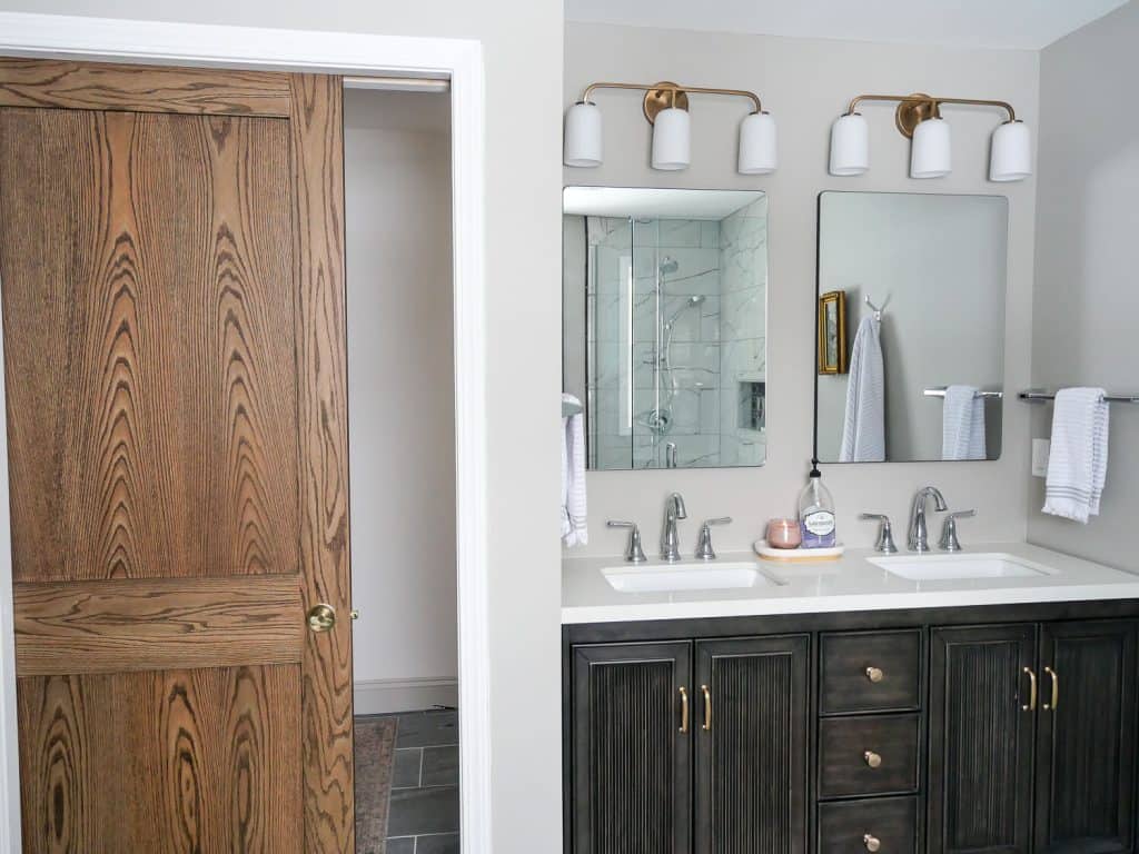 Wood door in a bathroom.