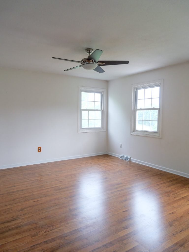 Empty bedroom with white walls.