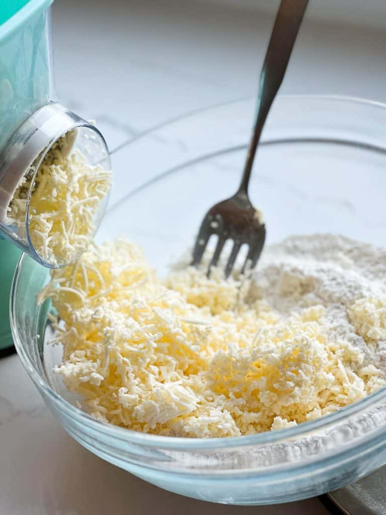 Butter grated into bowl.