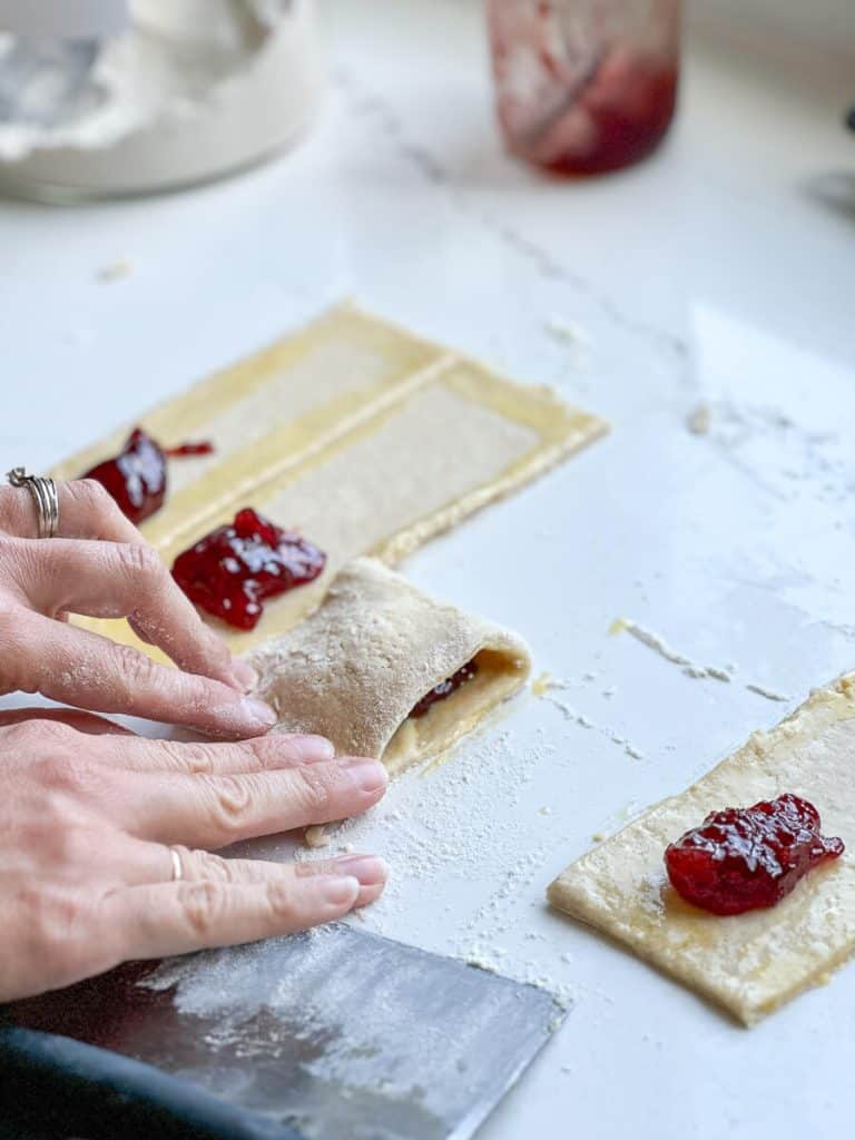 Forming pop tarts.