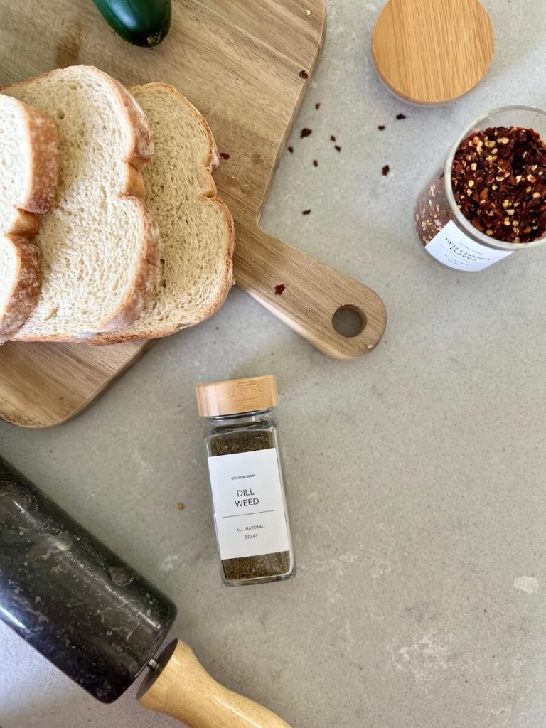 Bread and herbs on a countertop