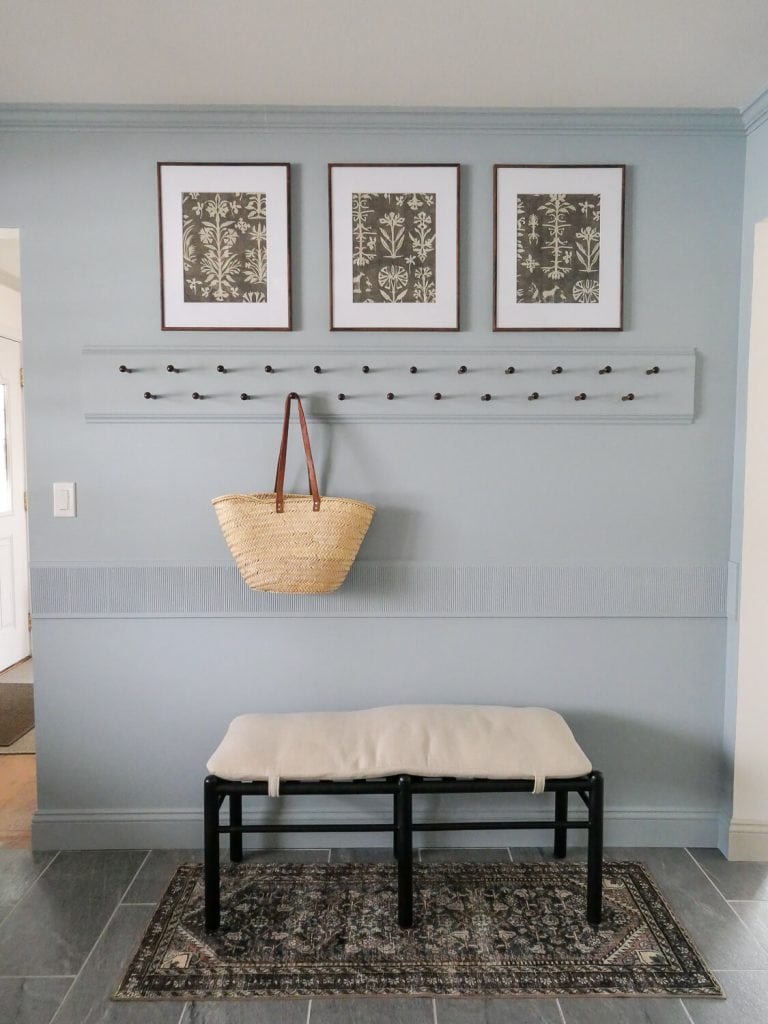 Peg rail in a mudroom.