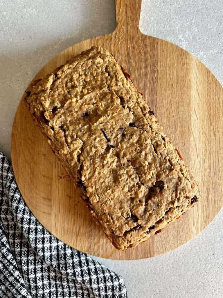 Loaf of banana bars on a cutting board