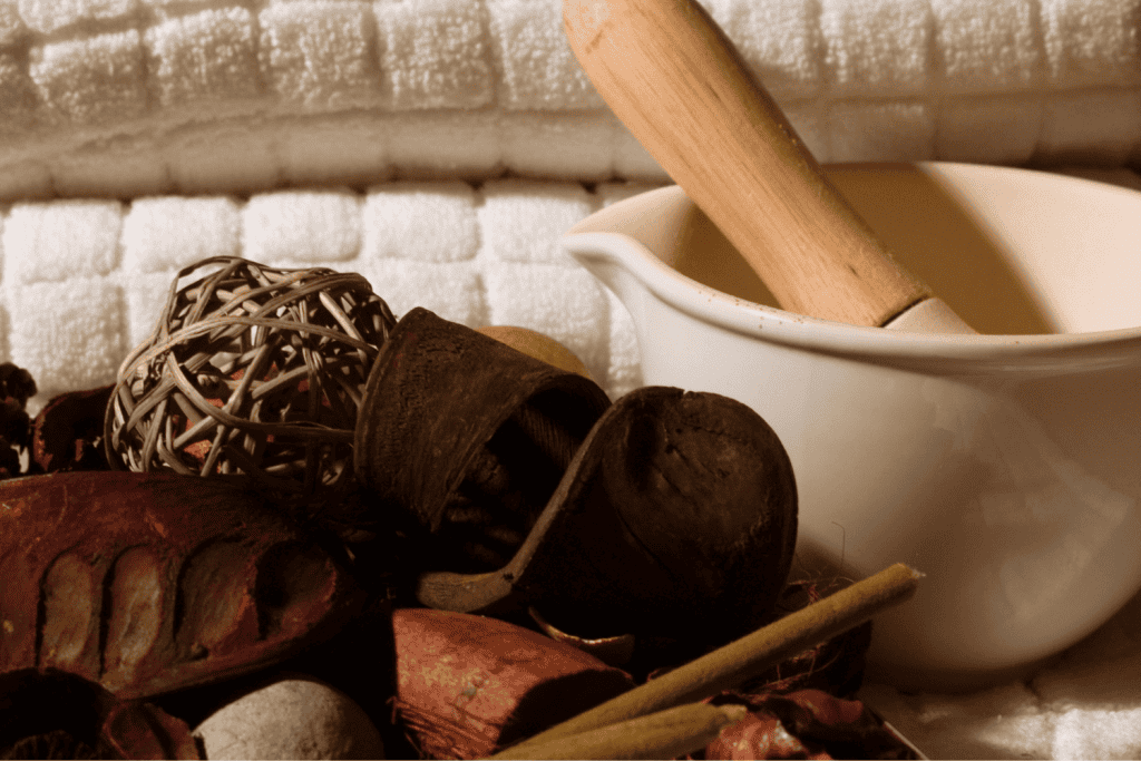 Potpourri with linens and a mortar and pestle.