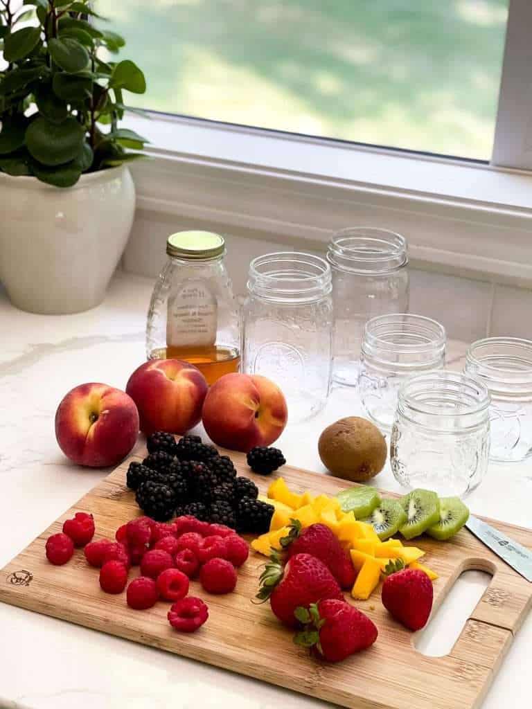 Prepping fruit for a honey parfait.