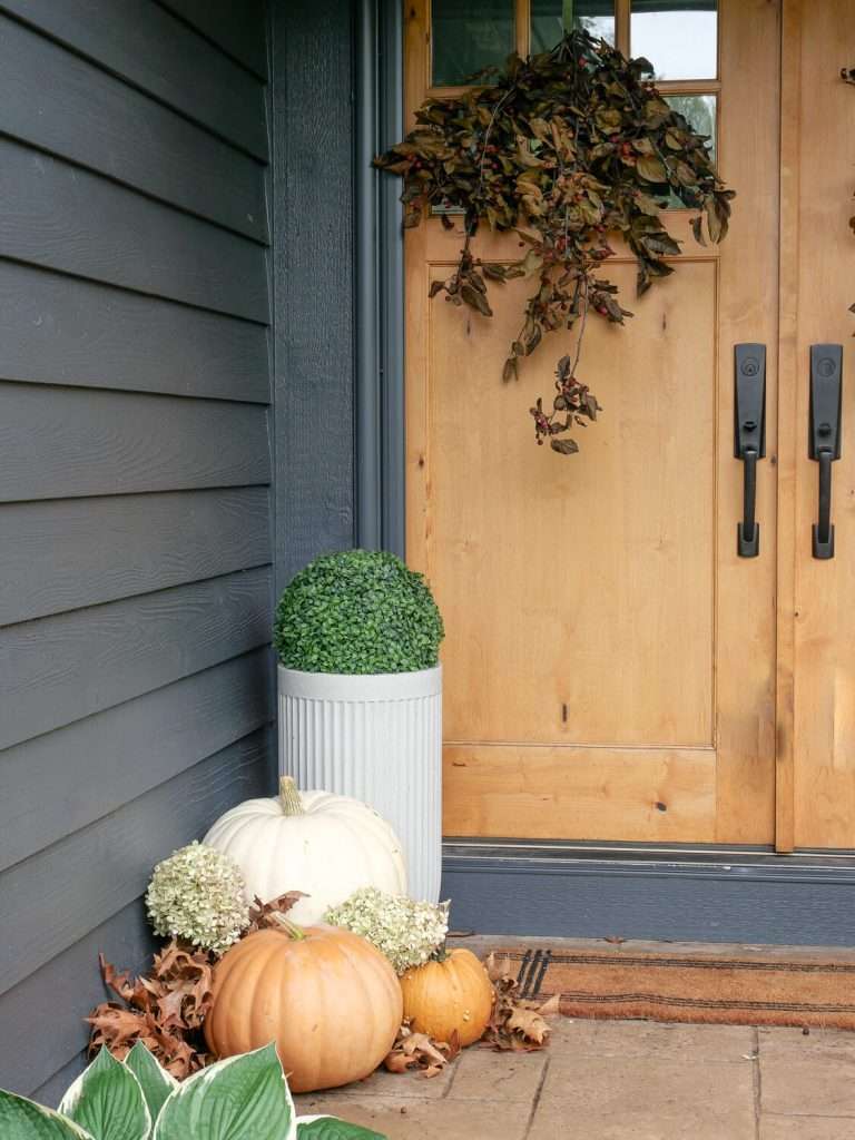 Pumpkins on a front porch