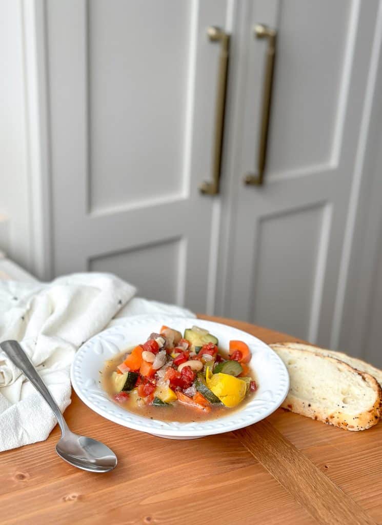 Bowl of soup on a countertop.