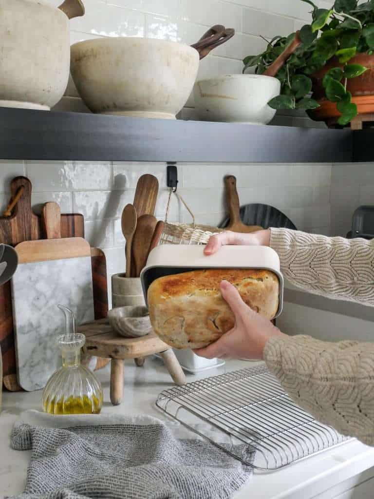 Sourdough coming out of loaf pan.