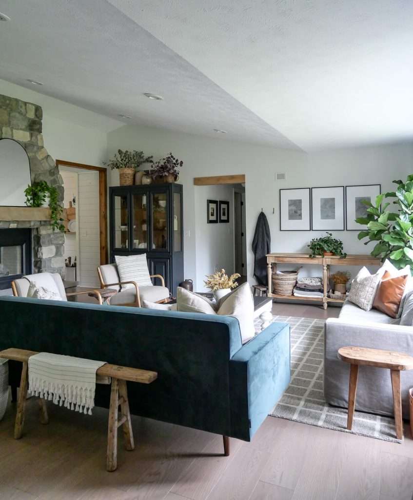 Velvet sofa in a living room decorated for fall.